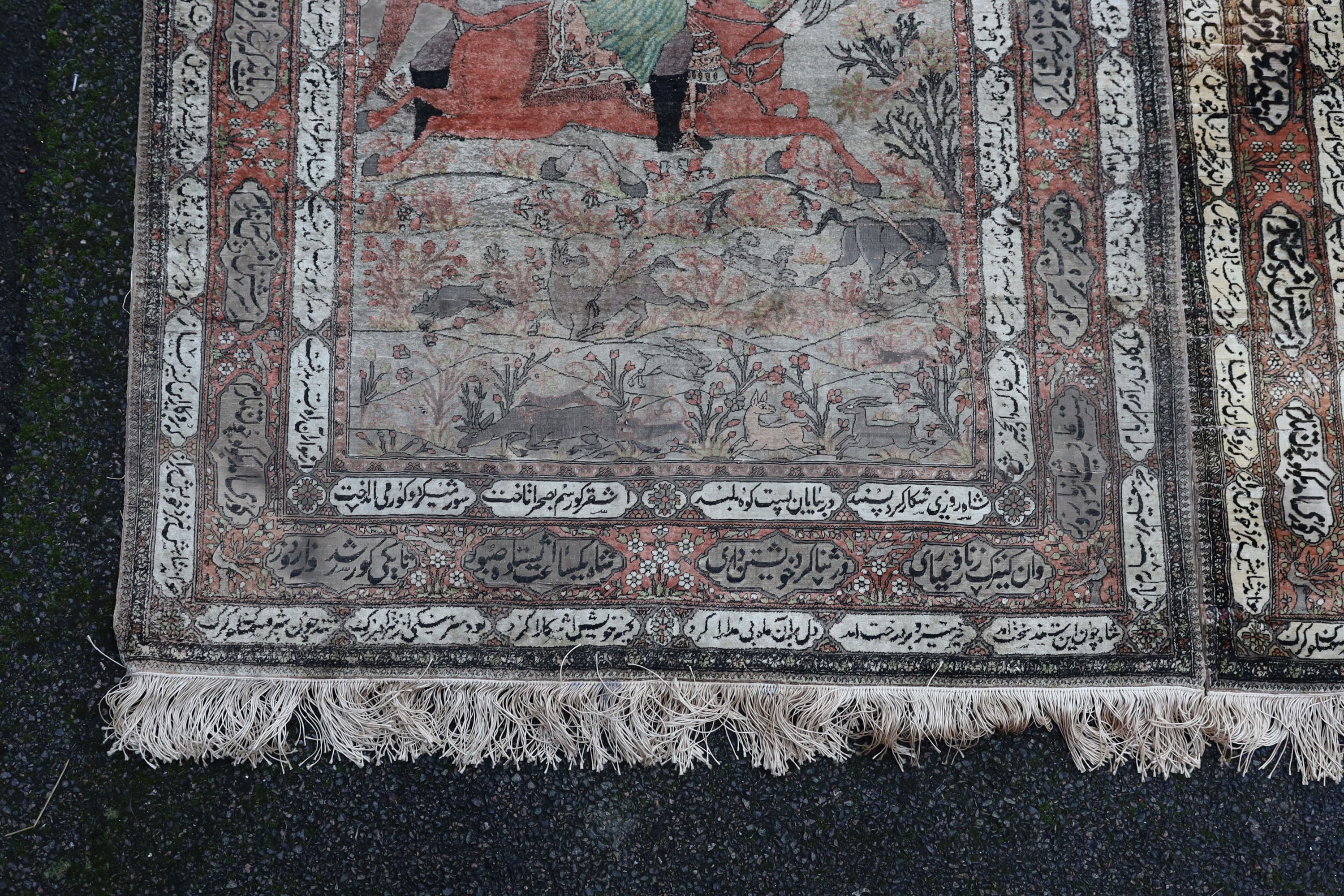 A pair of late 19th/ early 20th century Kashan silk pictorial rugs, woven with nobleman over hunters on horseback. 220 x 130cm.